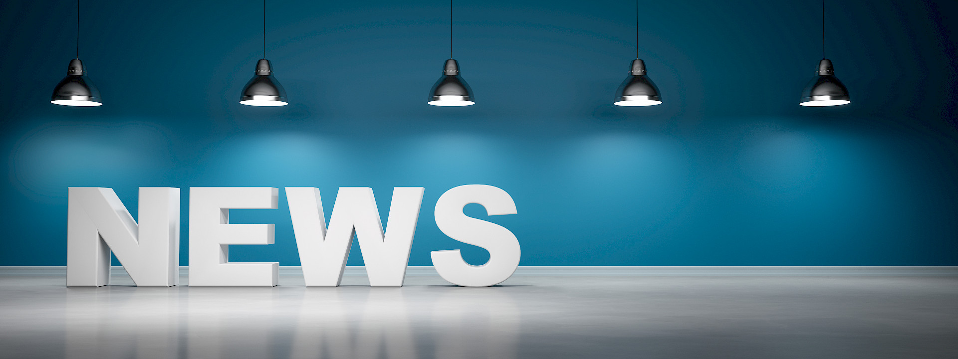 Letters of "NEWS" infront of a blueish wall with 5 lamps